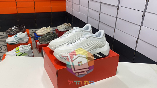 Laufschuhe adidas aus Strick mit Farbverlauf von Braun nach Orange 31