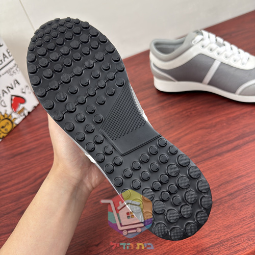 Dolce & Gabbana Sneaker mit Metallplatte an der Seite 9
