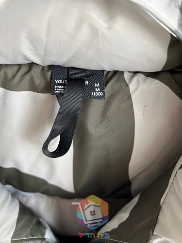 Piumino KAWS x The North Face Retro 1996 Nuptse mimetico, quattro colorazioni 17