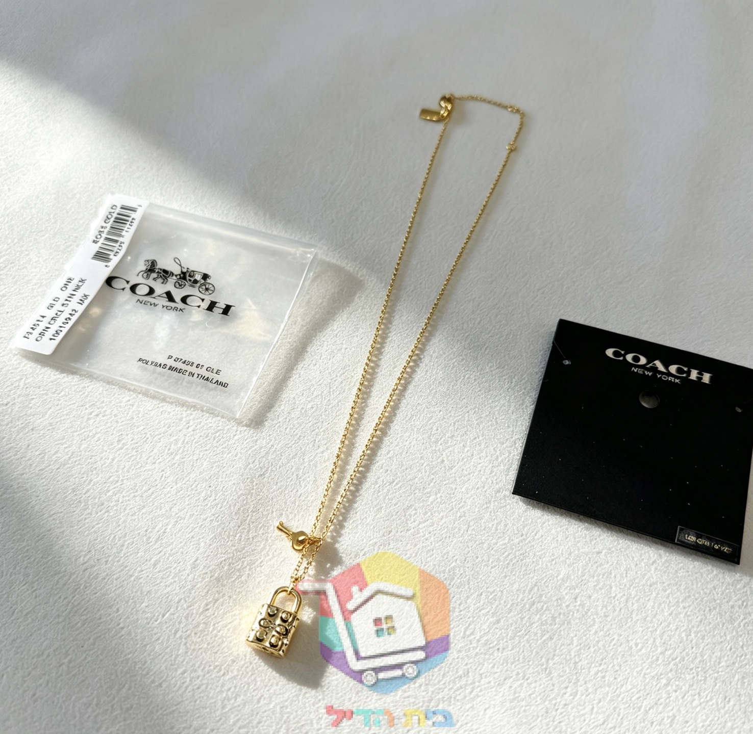 שרשרת Coach Quilted Padlock עם מנעול ומפתח