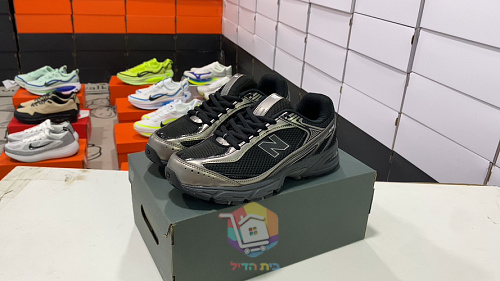 נעלי New Balance בשני דגמים, 1906W בשחור, טורקיז-אפרסק, לבן או כסף ו-509 שחור מטאלי, תמונה 38