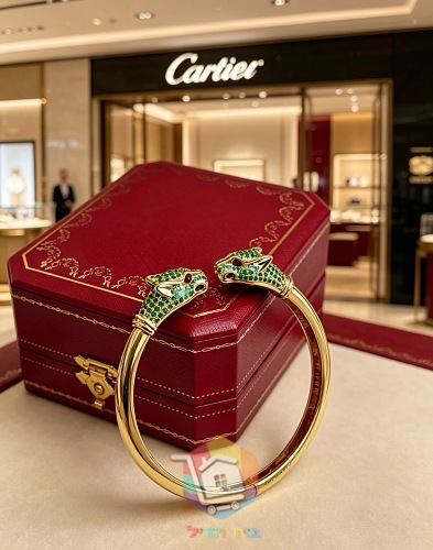 Cartier Armreif mit zwei Pantherköpfen 11