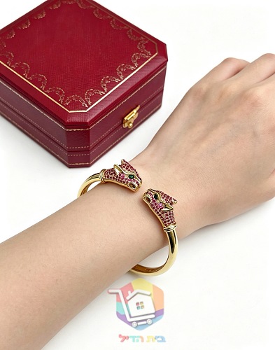 Cartier Armreif mit zwei Pantherköpfen 21